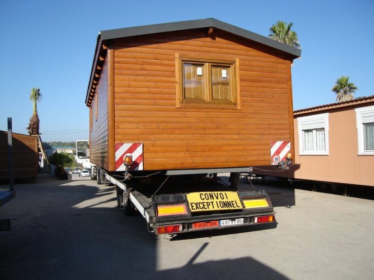 Precio de casas transportables, casa prefabricada CMC Clasica cargada en camión para su transporte